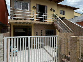 Ampla casa térrea, WiFi, estacionamento e segurança